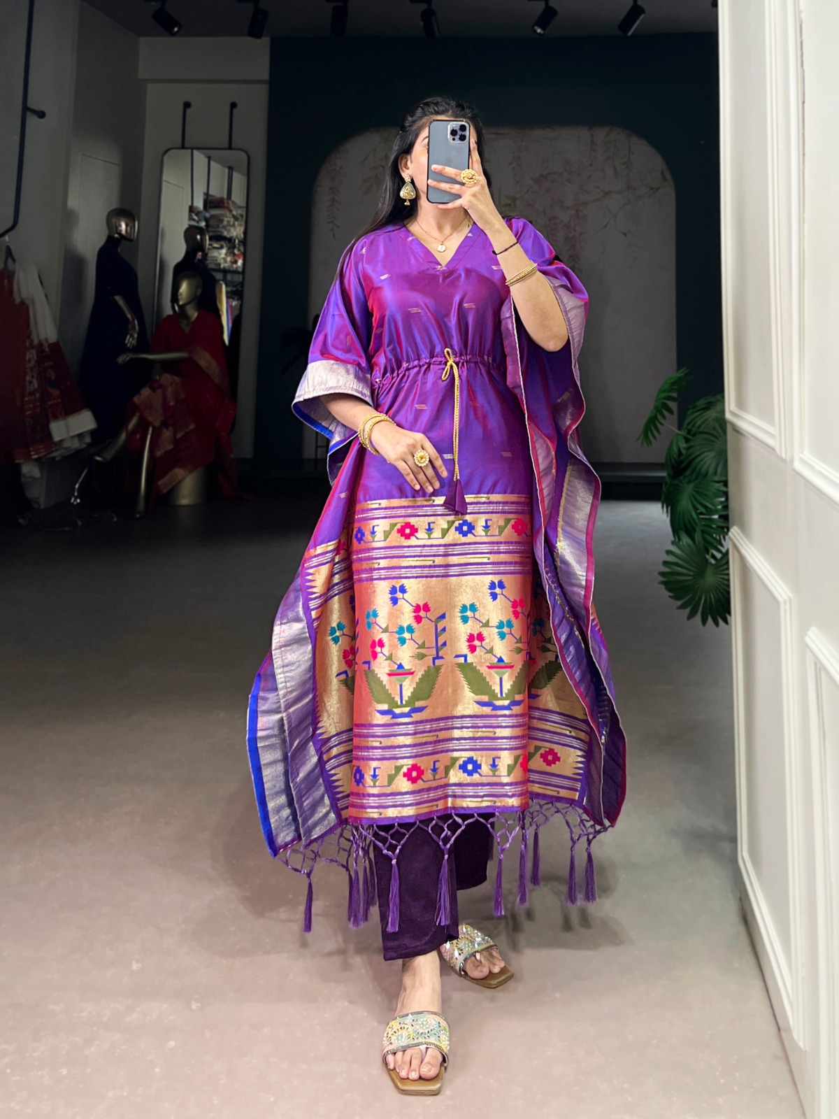 Jacquard Kaftan in vibrant purple with floral design.