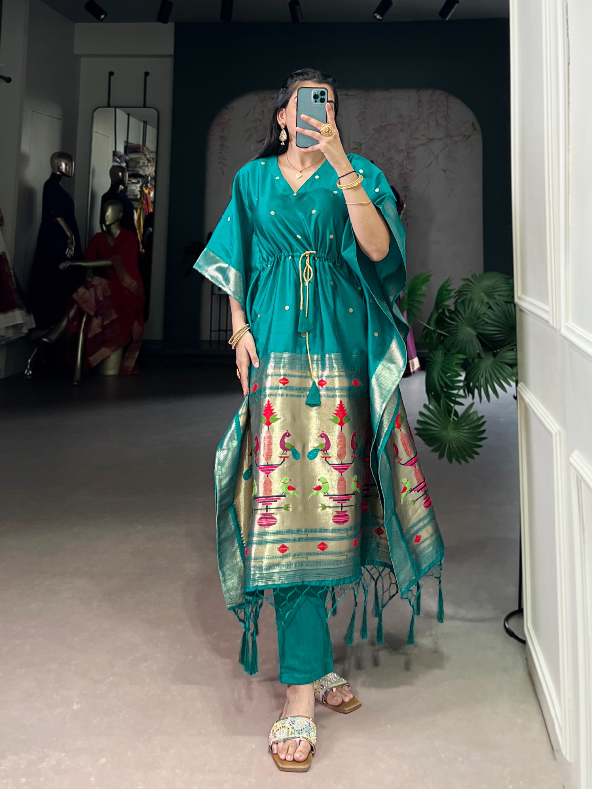 Teal Jacquard Kaftan with embroidered details.