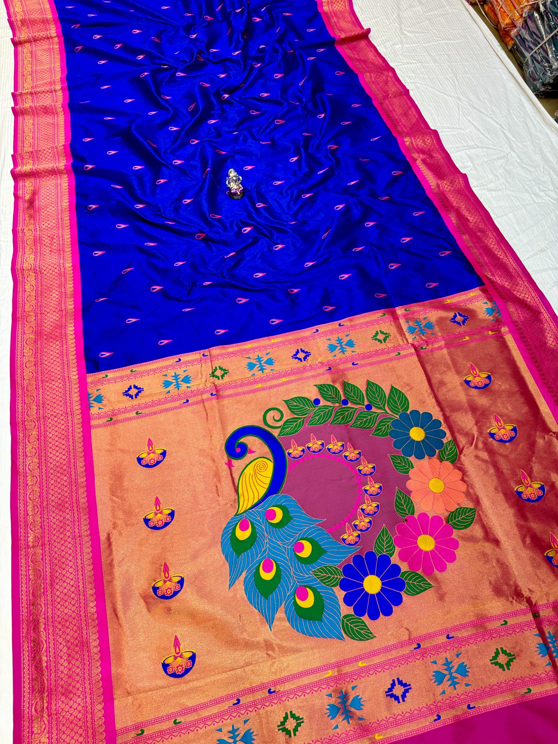 Jyoti Kadiyal Paithani in Premium Katan Silk with floral design.
