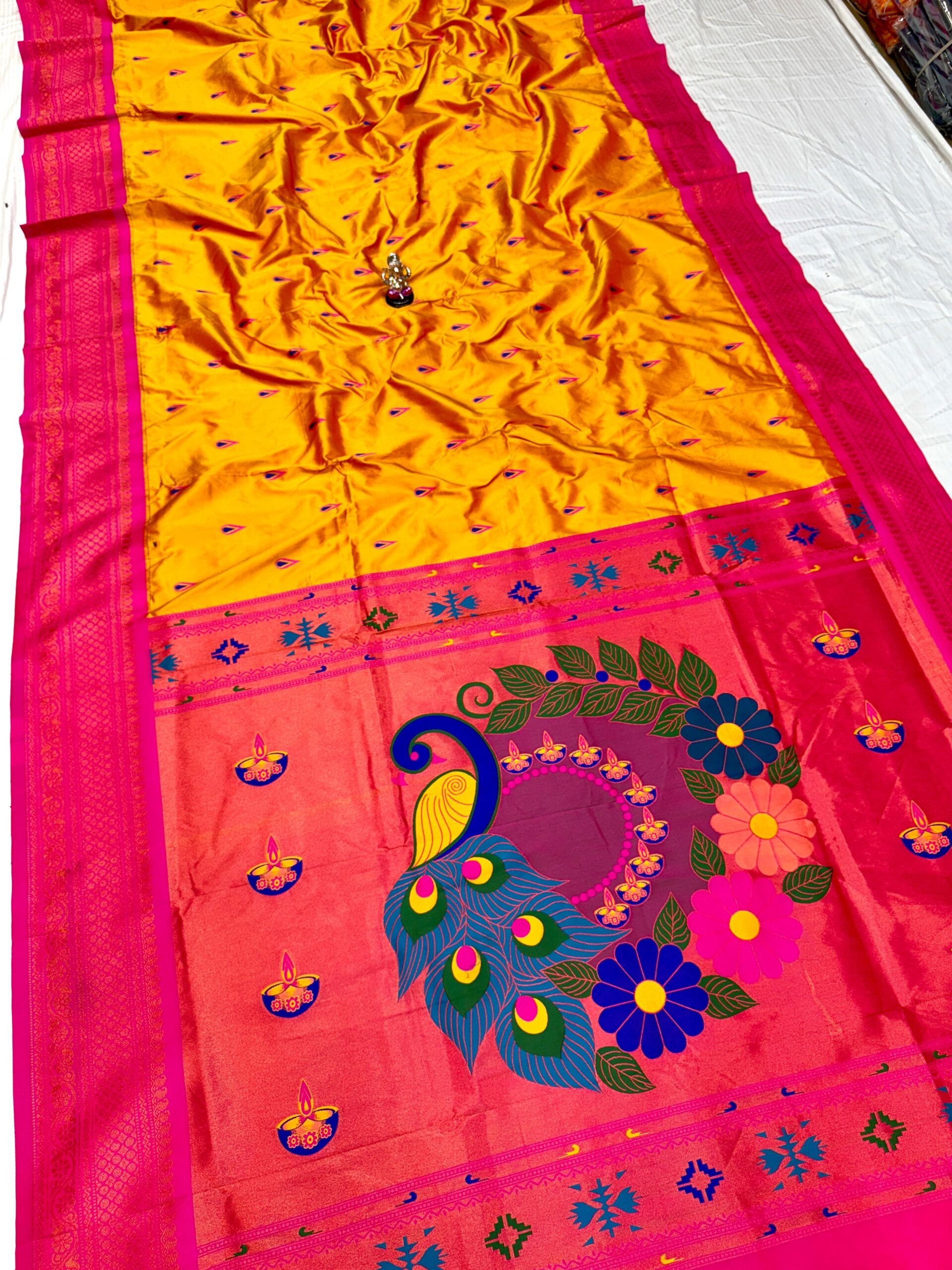 Jyoti Kadiyal Paithani in Premium Katan Silk with floral design.