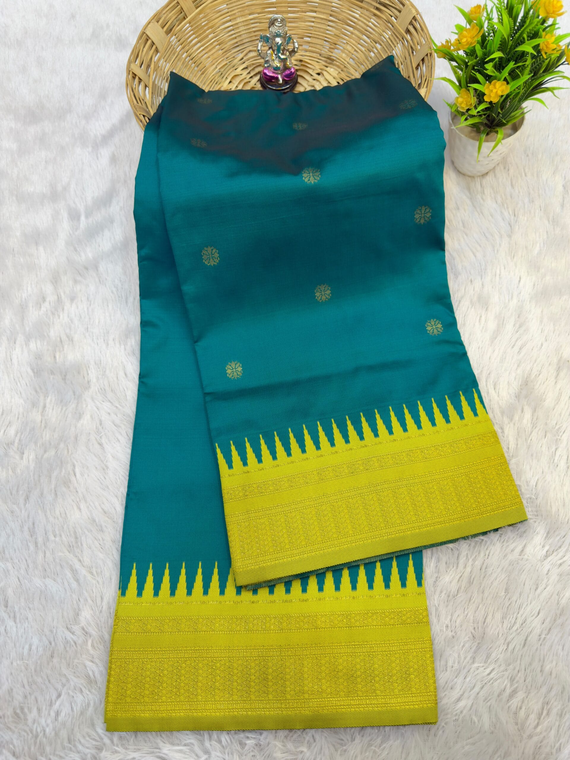 Half Silk Irkal Paithani Saree in teal with yellow border.